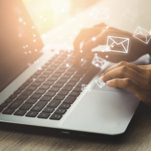 Email Marketing Strategies 2025 | Woman typing on computer