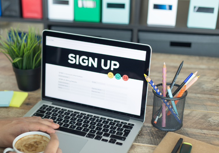 Landing Pages 101: A Guide for Business Owners | Computer with a sign up landing page | Netvolution