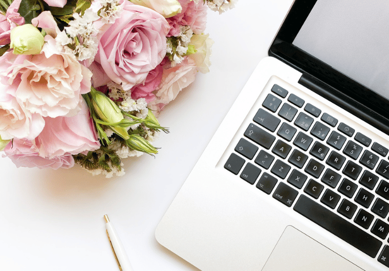 Top 10 Tips for a Great Website | Computer next to flowers | Netvolution